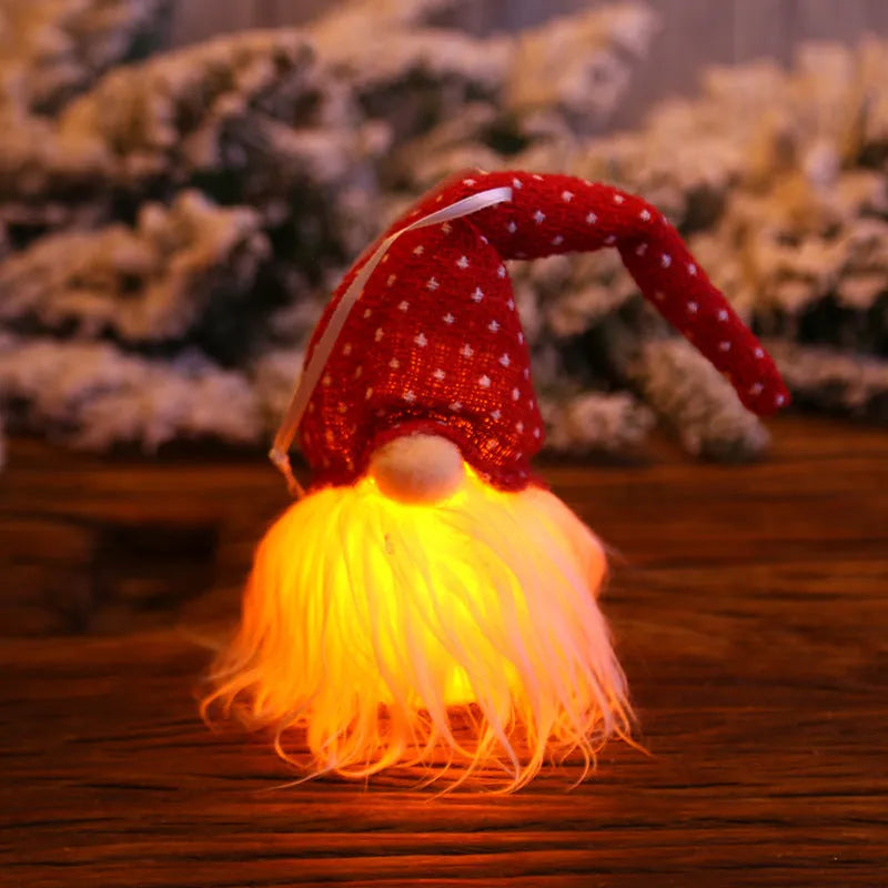 Handmade Swedish forester gnome LED tree pendant with warm light and snowflake details, 8x20 cm, beige colour