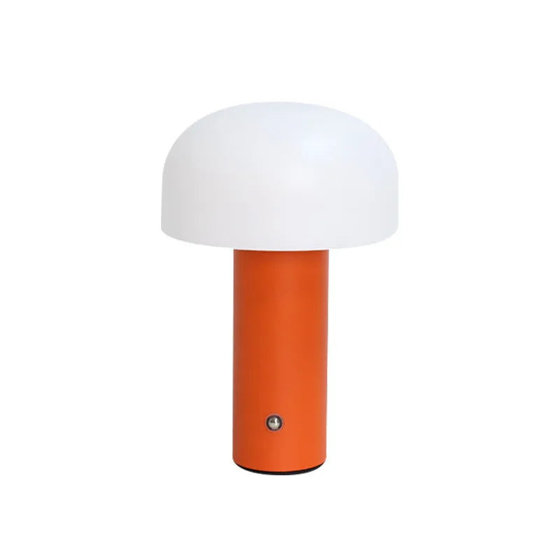 USB-powered dual-purpose table lamp in black, white, orange, or green colour on a desk.
