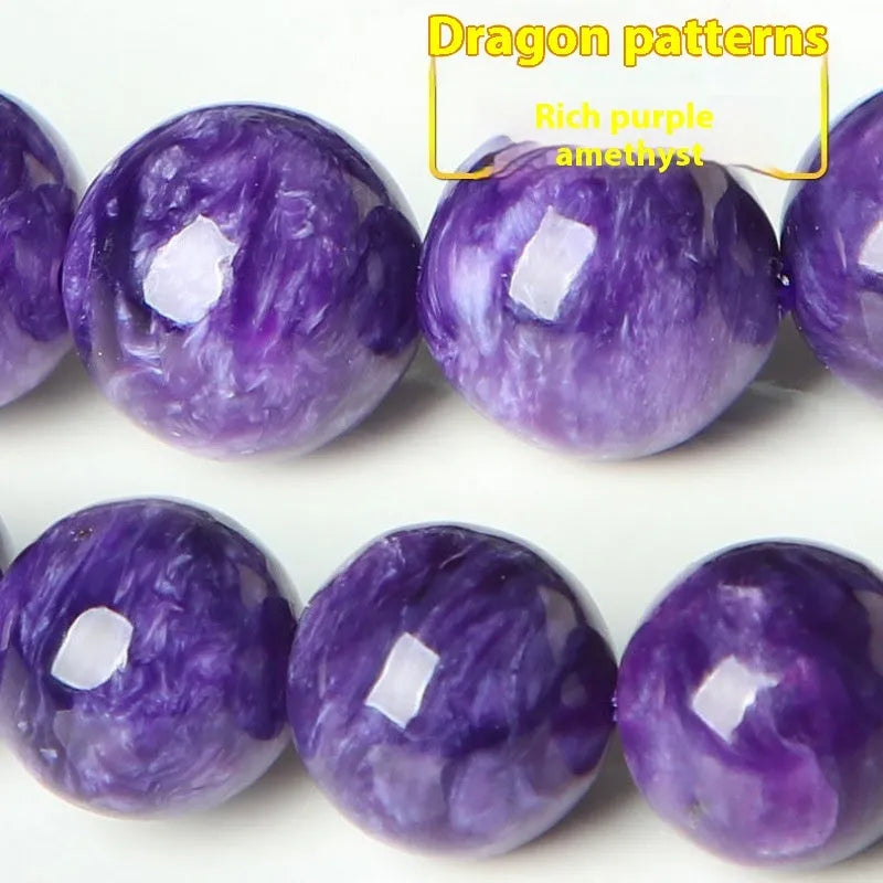 Natural transparent charoite crystal bracelet with platinum metal accents in hands bead design