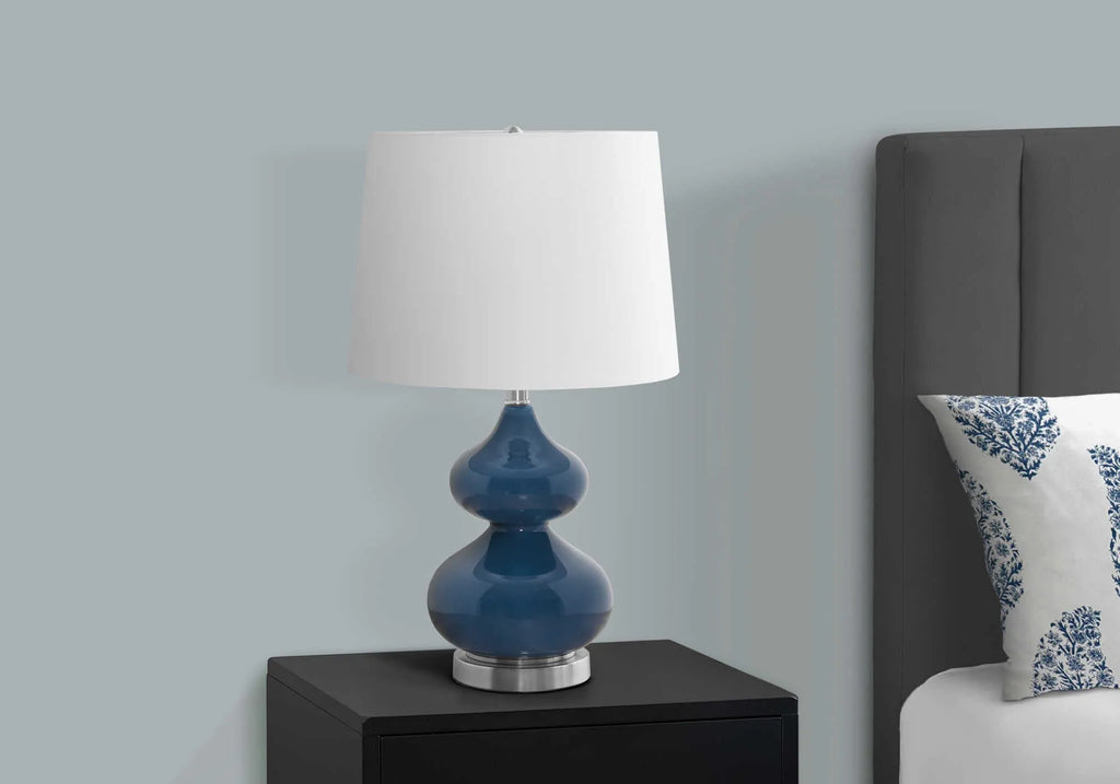 64cm tall crystal glass desk lamp with dark blue cloth lampshade on wooden desk