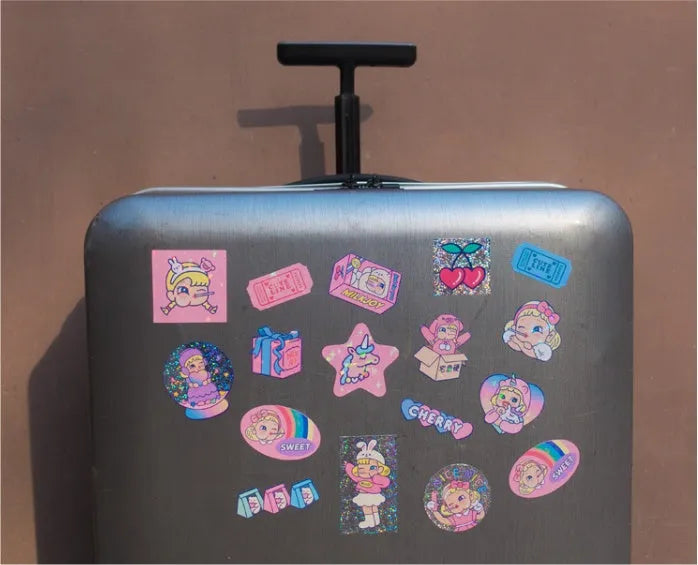 Cartoon sticker pack with 16 PVC stickers and storage box showing cute girl and heart designs