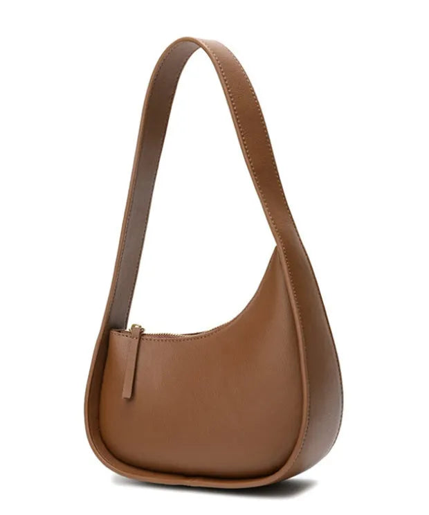 Genuine leather ladies shoulder bag with half moon design and wide strap
