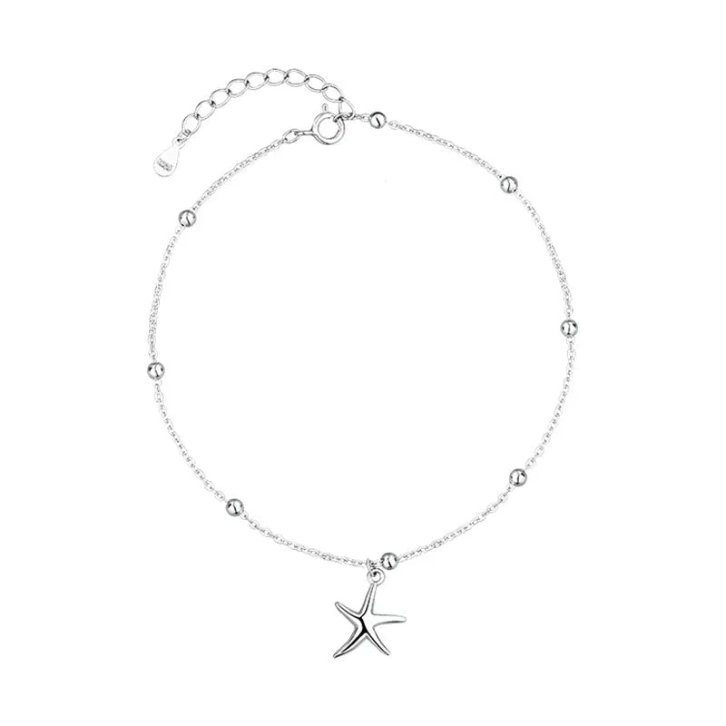 S925 sterling silver anklet with starfish charm and round beads on an adjustable chain.