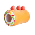 Yellow cake roll shaped plush cat toy with short plush fur on a neutral background