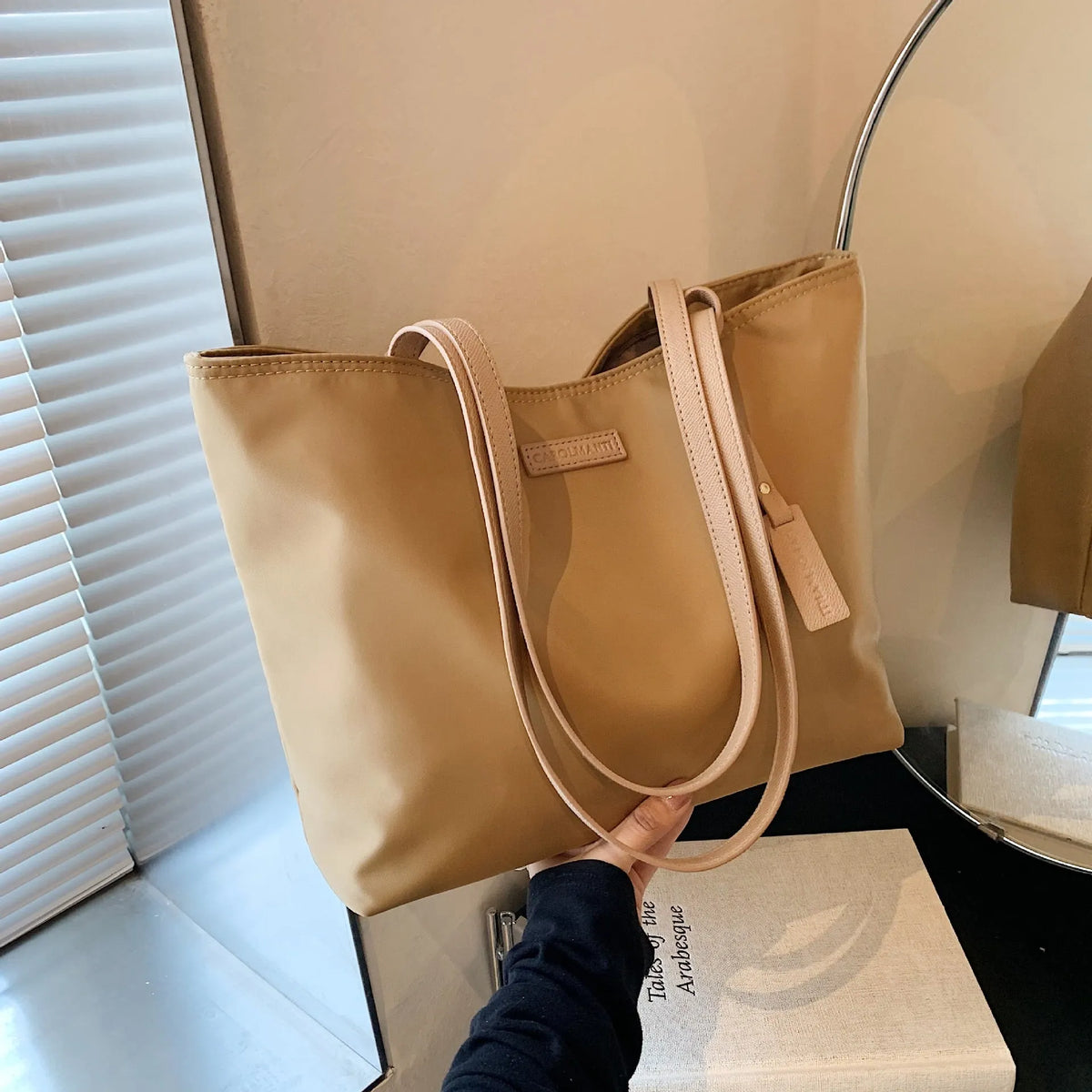 Women's large capacity soft Oxford cloth shoulder bag in black, horizontal square shape, with external sandwich pocket