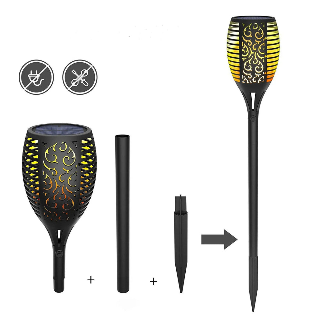 Black solar LED flame torch lamp with warm white flickering effect on a lawn, 83cm tall