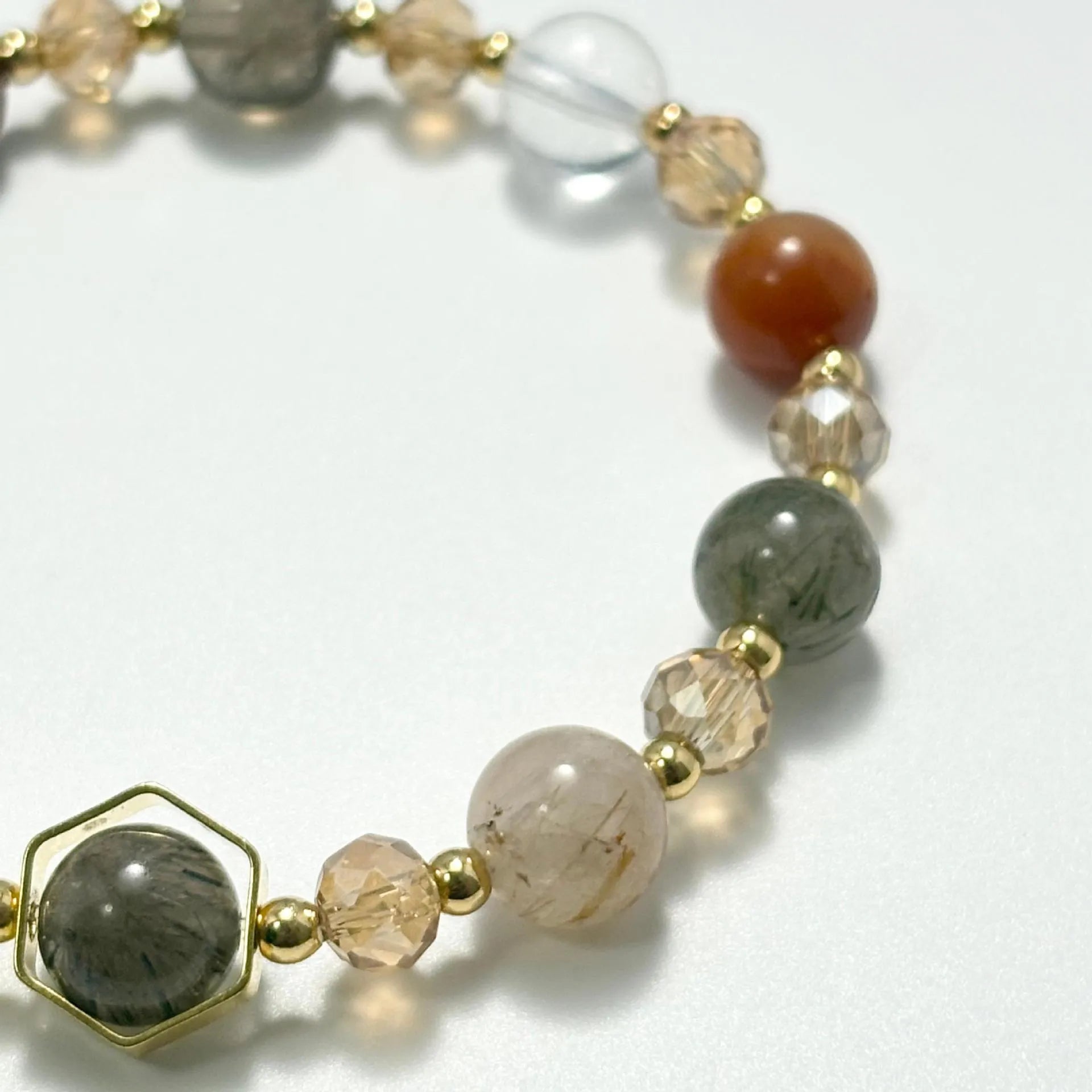 Gold citrine bracelet with hand-woven 8mm beads featuring Chinese auspicious charms