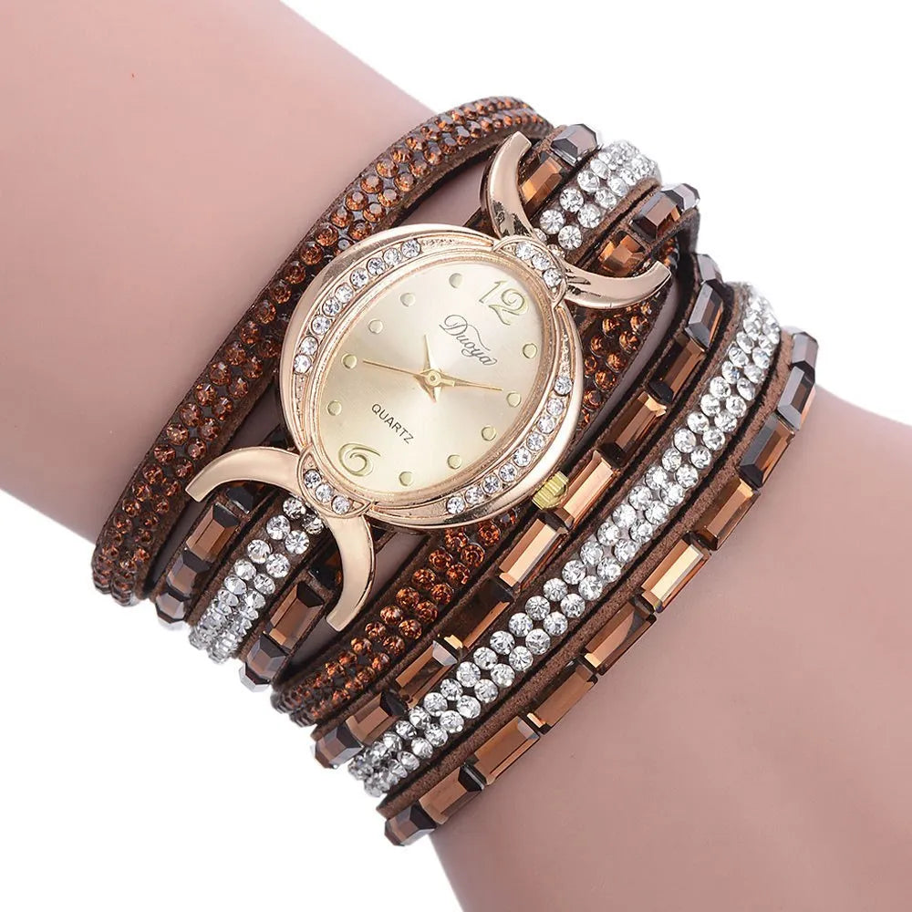 New casual rhinestone watch for women with round stainless steel case, leather band, and analog quartz movement