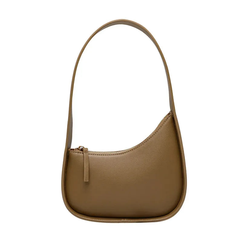 Genuine leather ladies shoulder bag with half moon design and wide strap