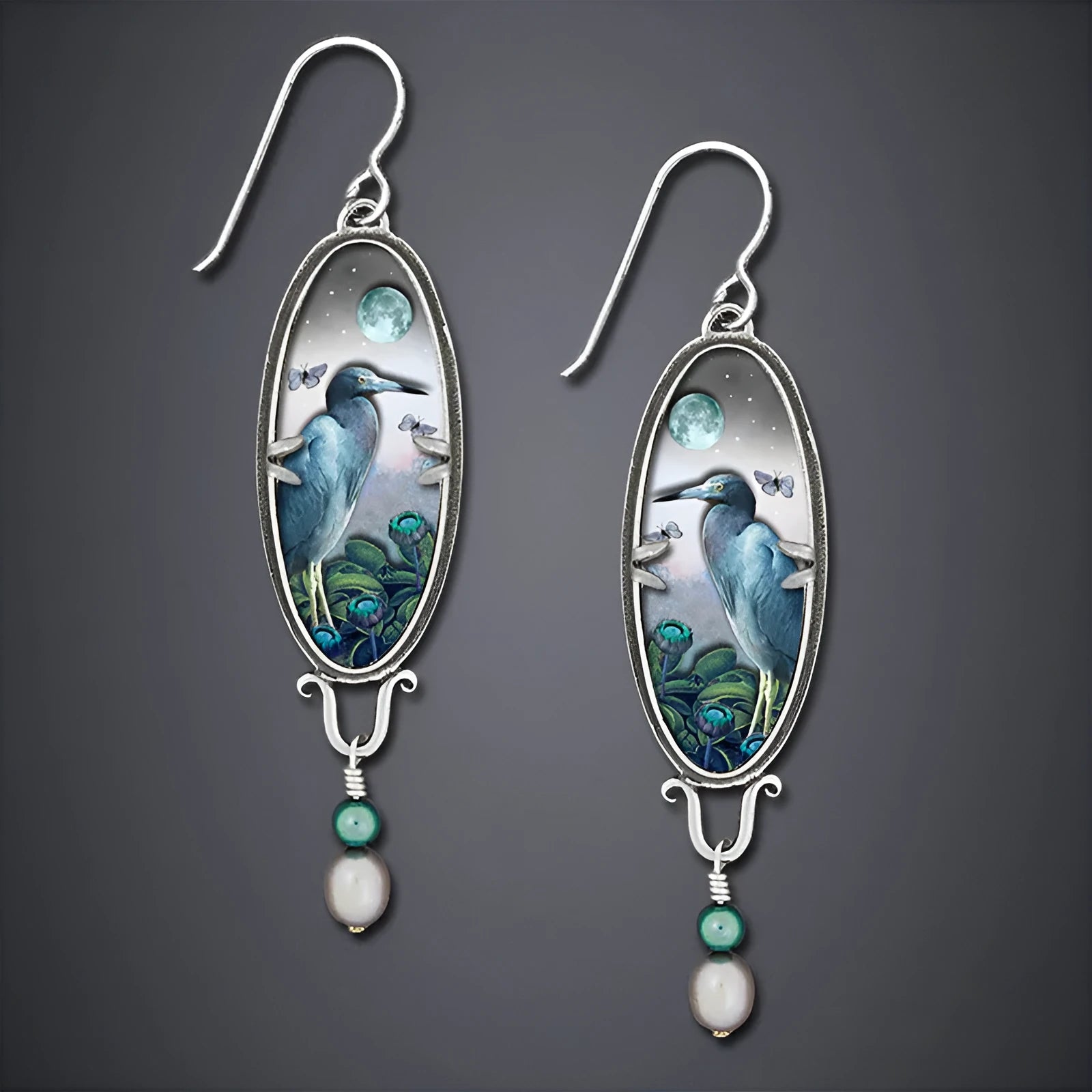 Silver retro-style women's drop earrings with a detailed bird and flower design.