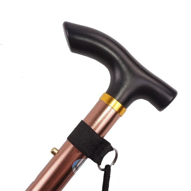 Aluminium folding walking cane with a non-slip handle, shown extended and in silver colour.