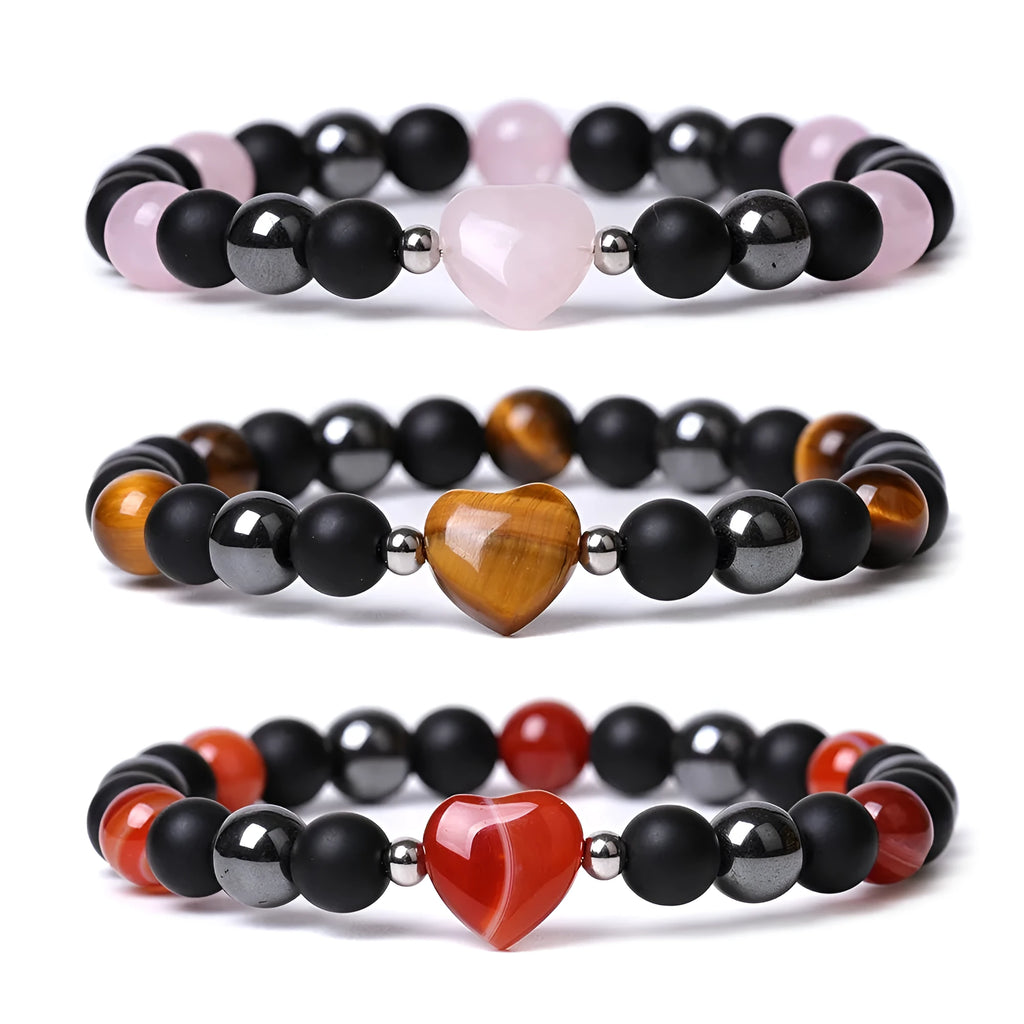 Hand-cut peach heart stone bracelet with geometric universe and moon design in various colours.