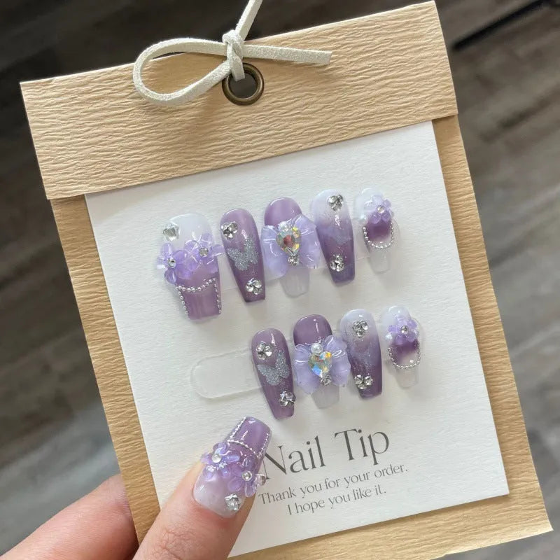 Handmade nail sticker sheet with purple iris tectorum butterfly design and nail glue tube in pack