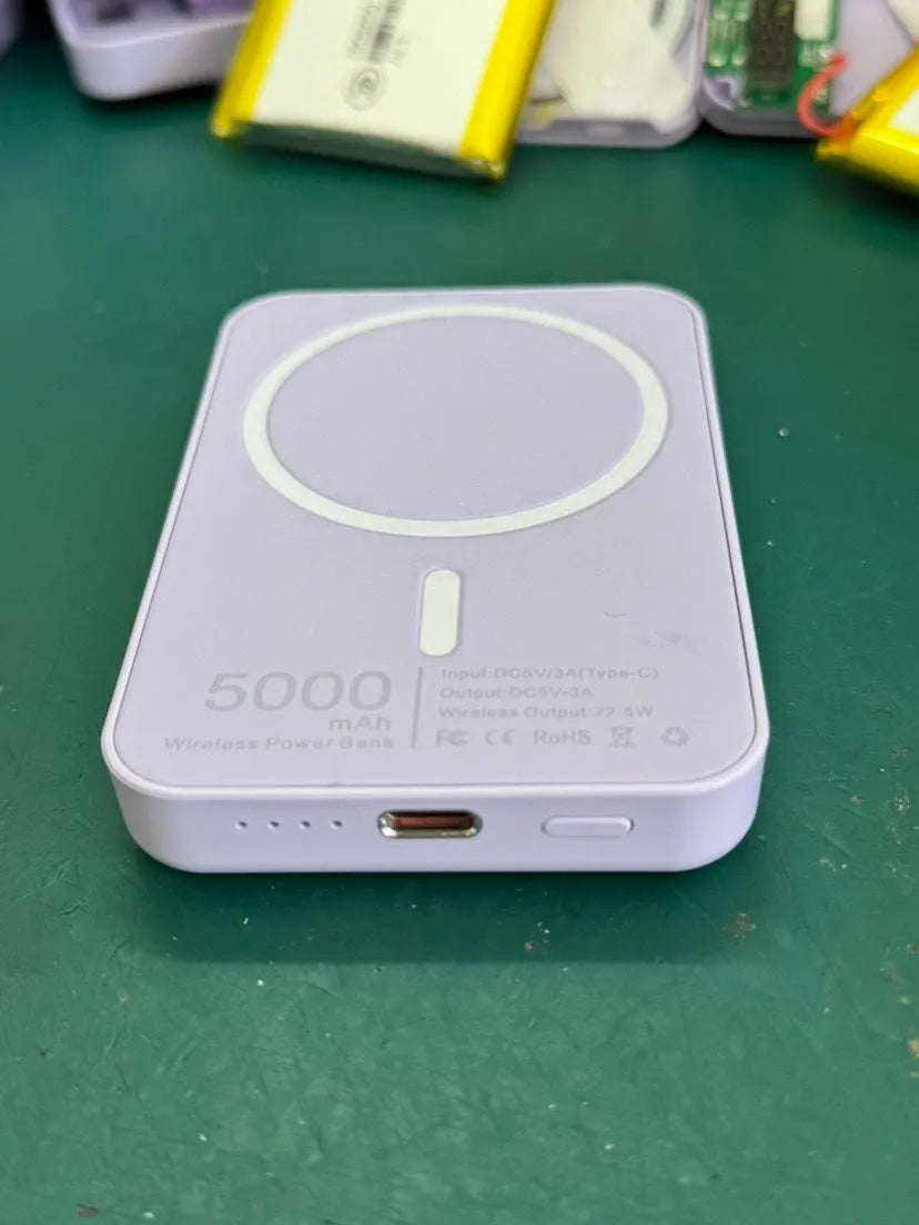 White portable power bank with magnetic wireless charging and 5000mAh capacity
