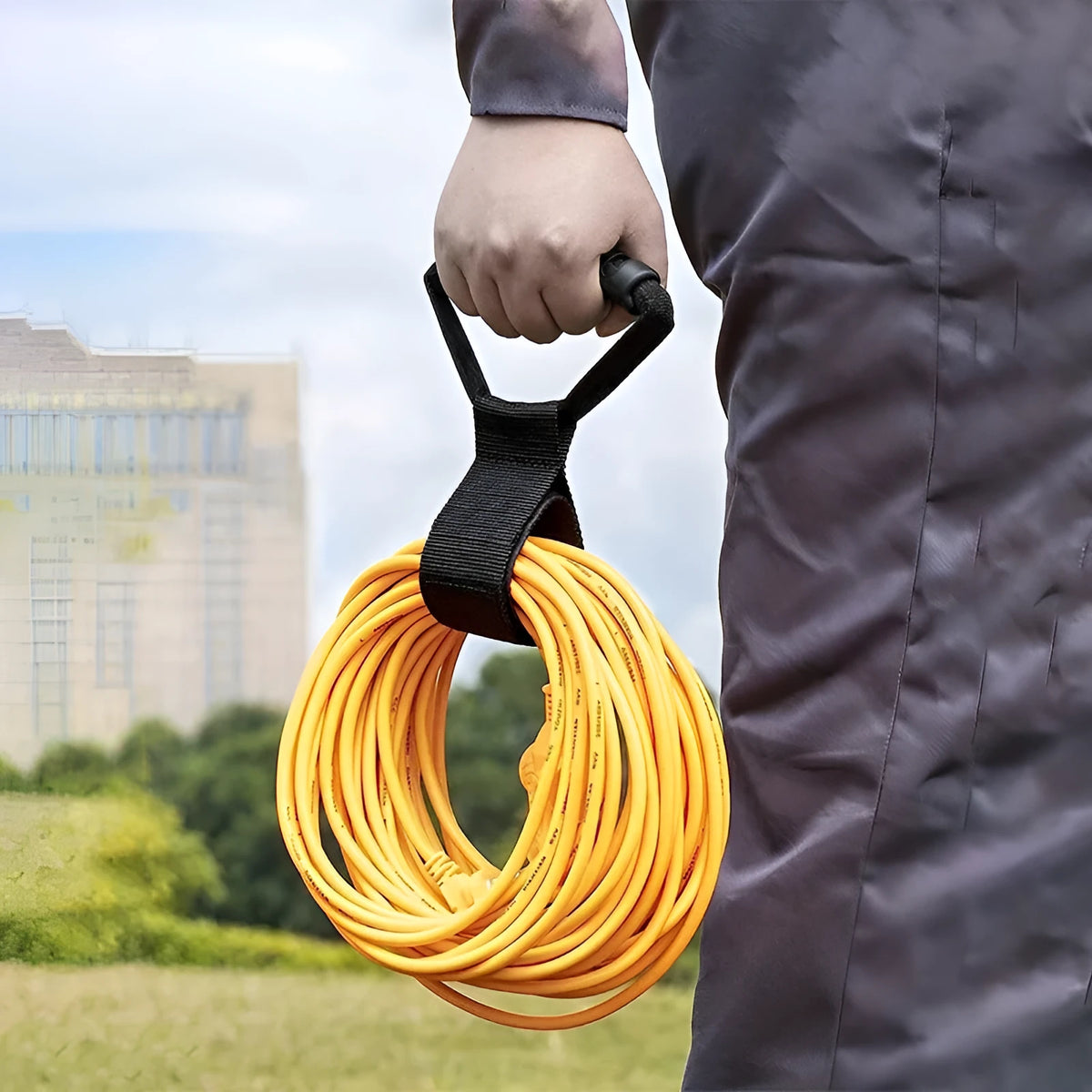 Portable heavy-duty nylon storage strap with velcro handle in standard colour, lying flat against a neutral background.