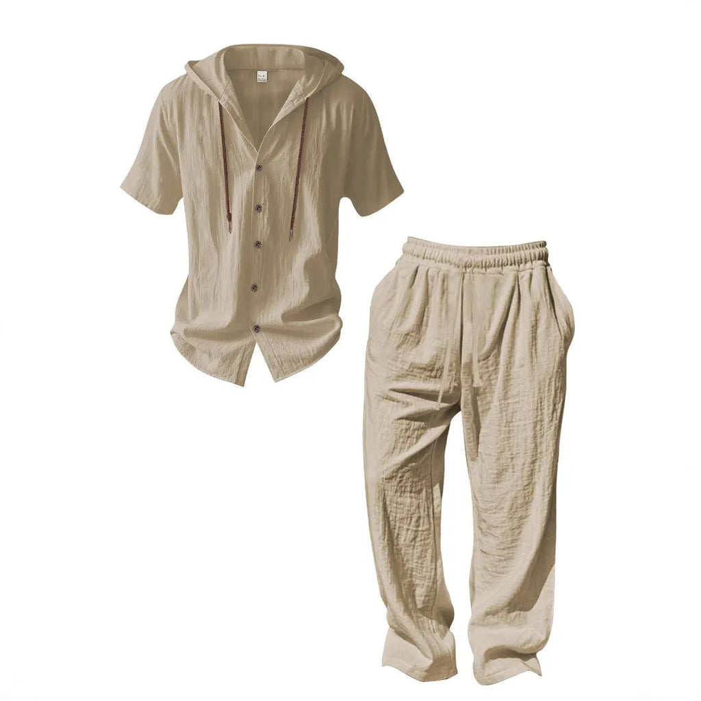 Men's grey cotton sports leisure suit with long sleeves and trousers on a hanger
