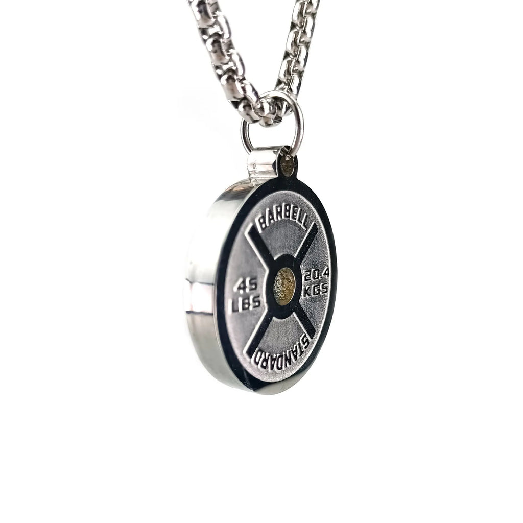 Polished stainless steel barbell disk pendant necklace on a choice of pearl, gold, or black 60cm chain.