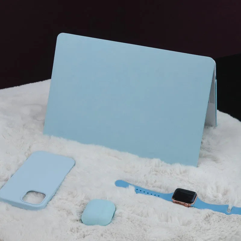 Dream Blue 16 inch laptop sleeve with colourful sticker-style print, open showing inner lining
