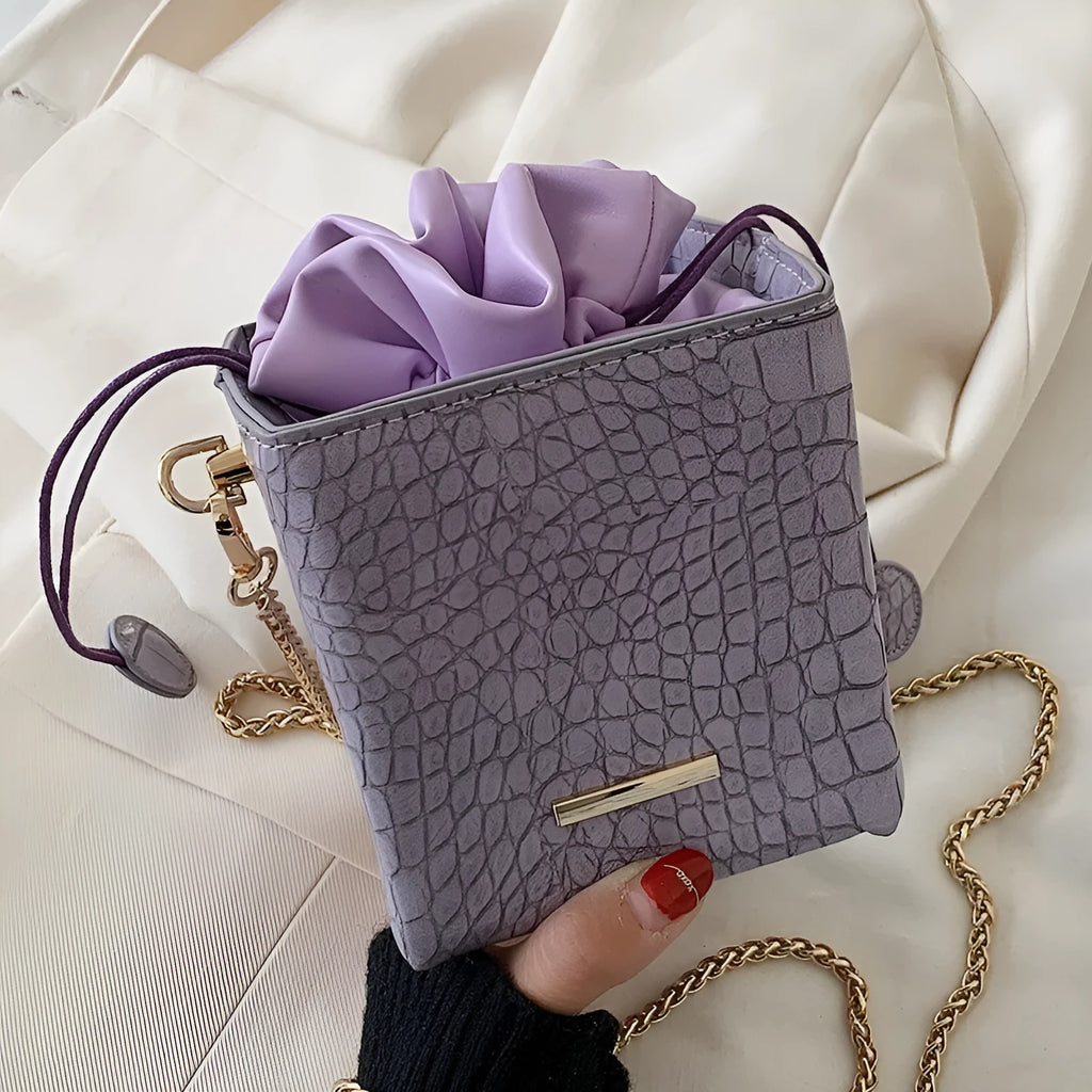 Korean-style small black PU bucket bag with a silver chain strap, shown open.
