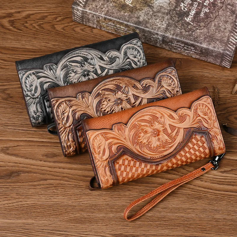 Vintage brown floral embossed women's tri-fold leather wallet showing interior organisation