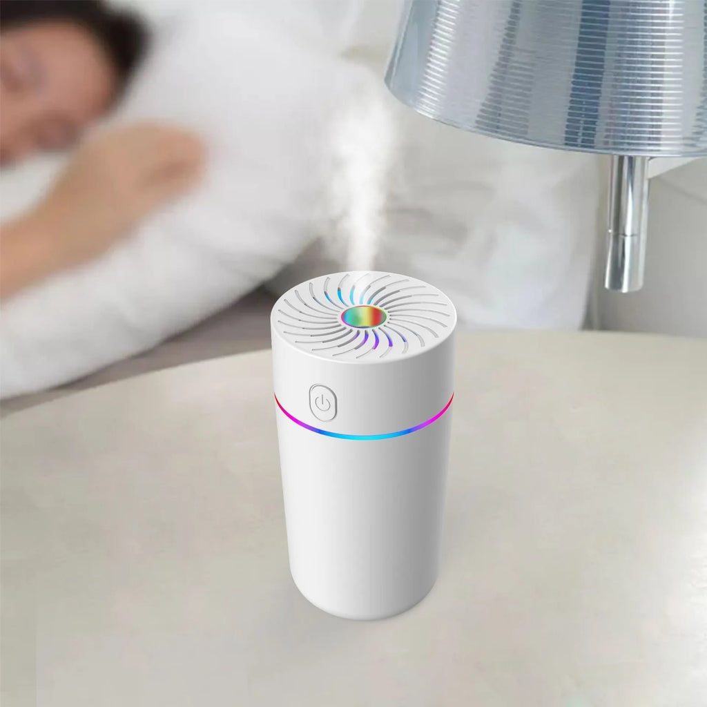 New car USB mini humidifier with aromatherapy function in white, shown with timer dial