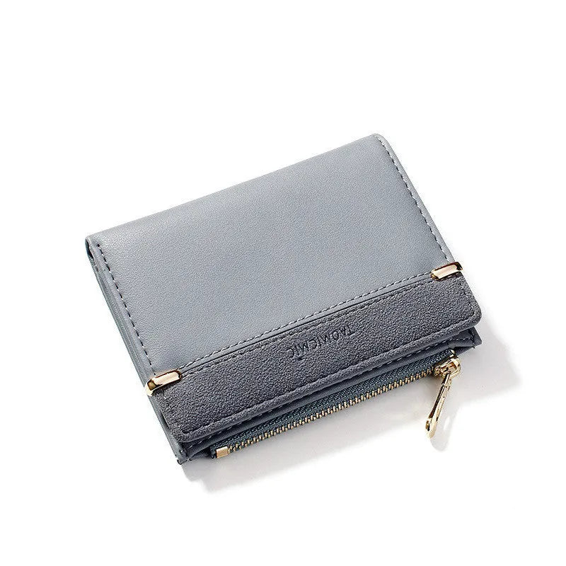 Ladies foldable wallet with zip closure showing multiple internal card slots and compartments