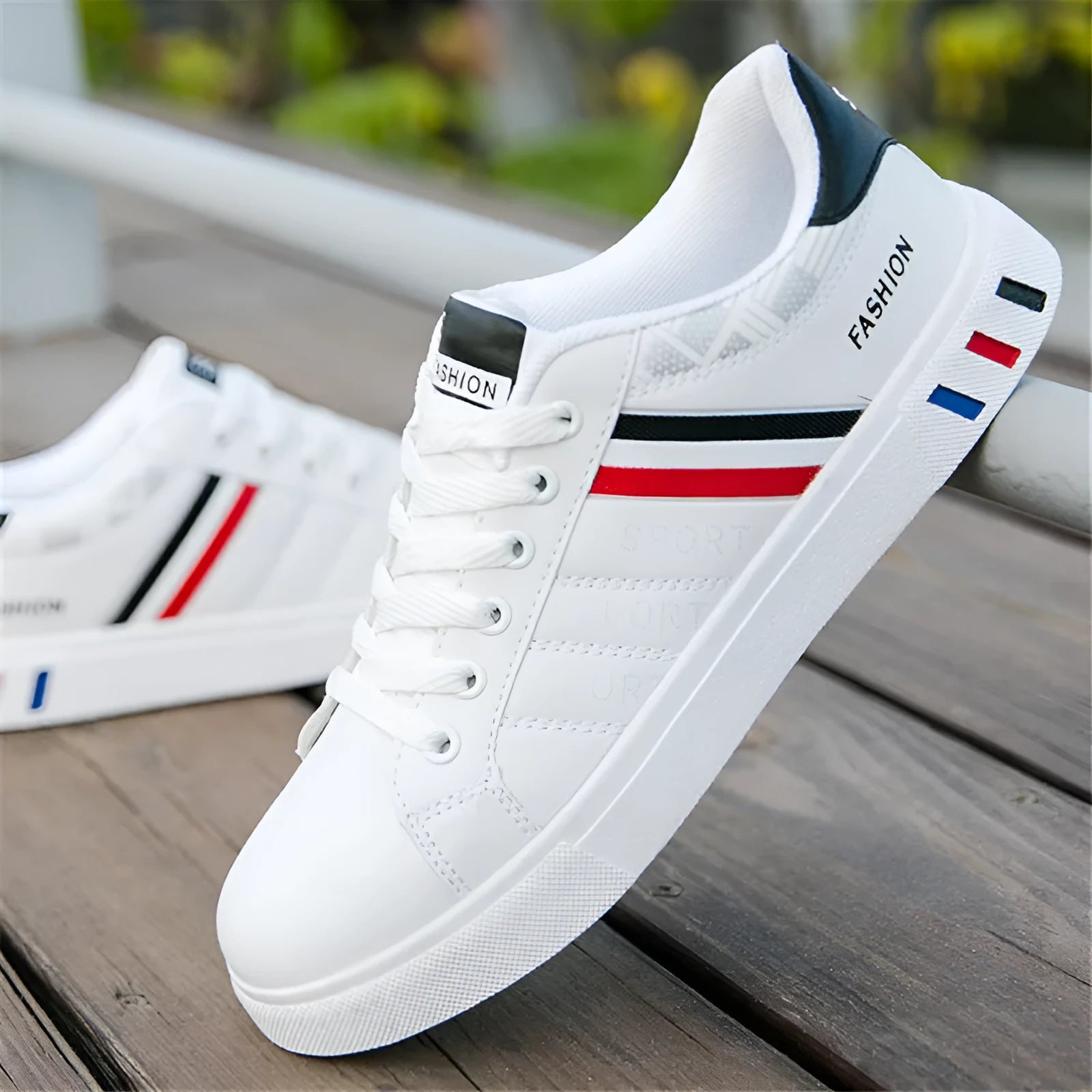 Sports shoes in black, grey, or white colours showing sizing chart with measurements 245mm to 270mm