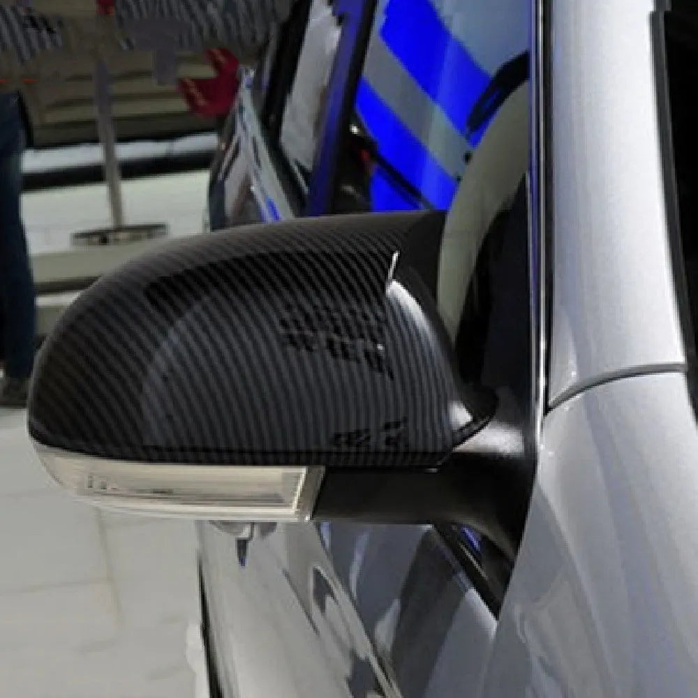 Pair of horn bright black plastic reflector shells for Volkswagen Sagitar 2006-2011.