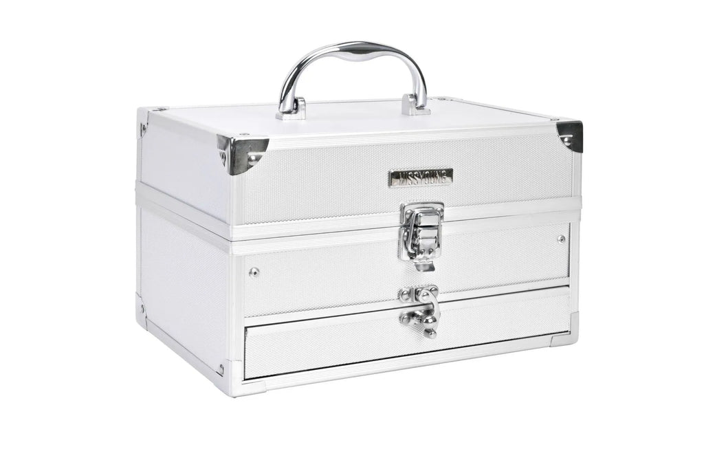 Silver makeup set with eye shadow, blush, lip gloss, lip pencil, and brush in a compact case