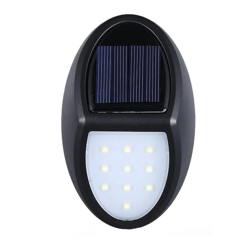 Black rectangular LED solar wall light with integrated solar panel on top