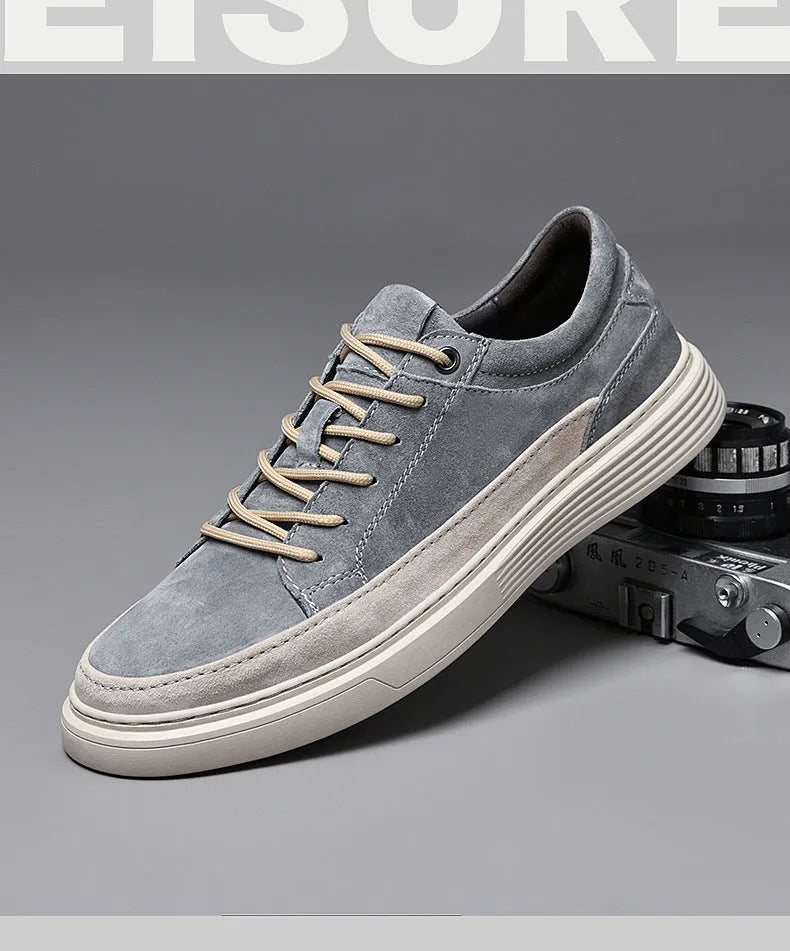 Men's grey casual leather skate shoes with round toe and lace-up front