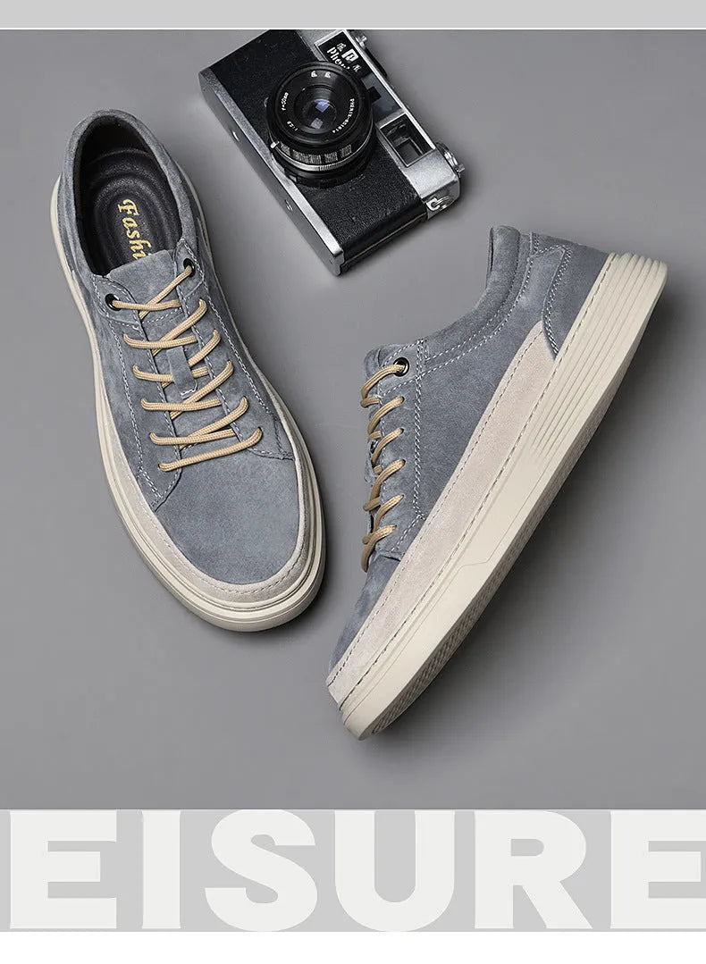 Men's grey casual leather skate shoes with round toe and lace-up front