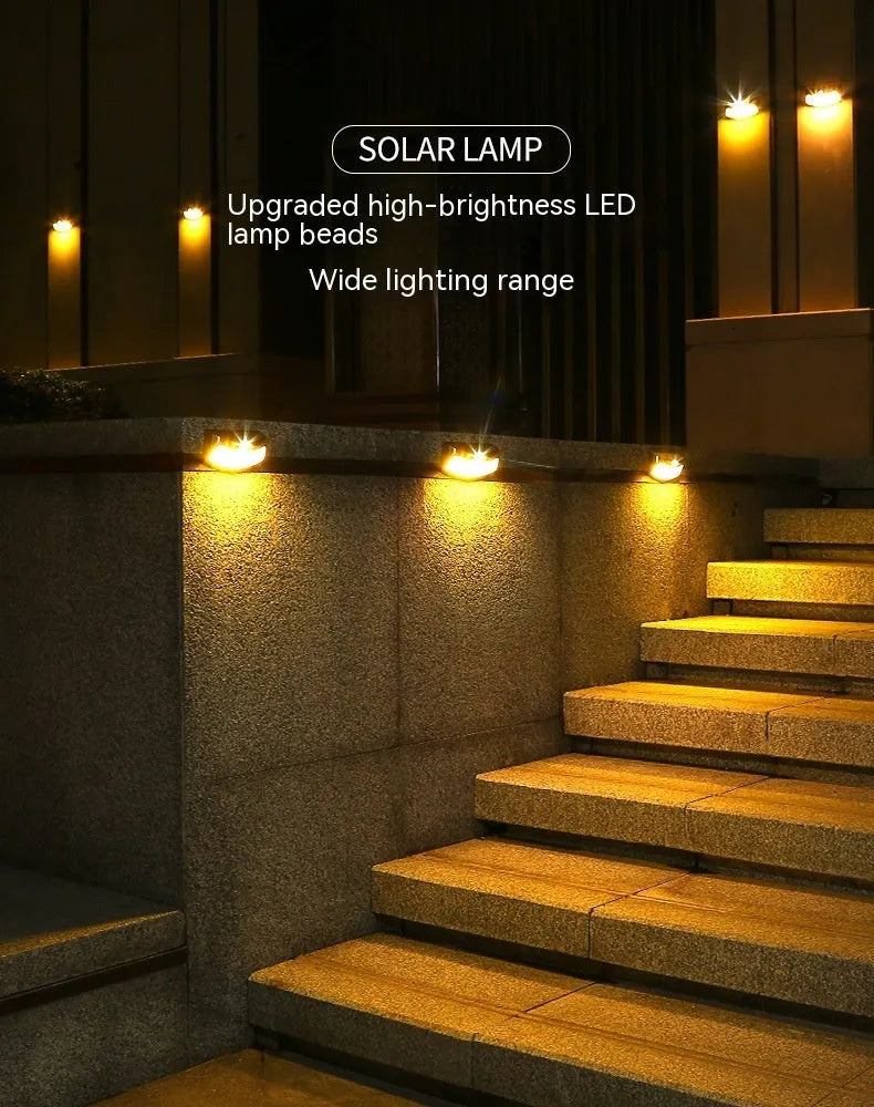 Solar-powered outdoor wall lamp with smiling face design for garden or courtyard lighting.