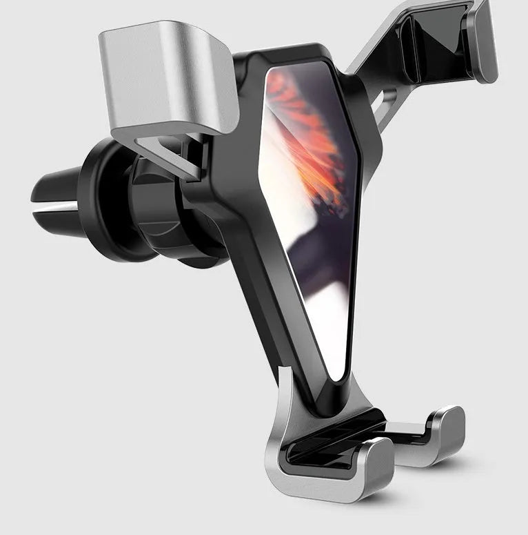 Universal smartphone car air vent mount in Elegant Black with silicone steel core and alloy structure, clipped to a vehicle air vent
