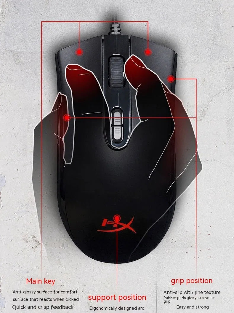 HyperX Pulsefire Core RGB wired gaming mouse in black and pink colours on a desk.
