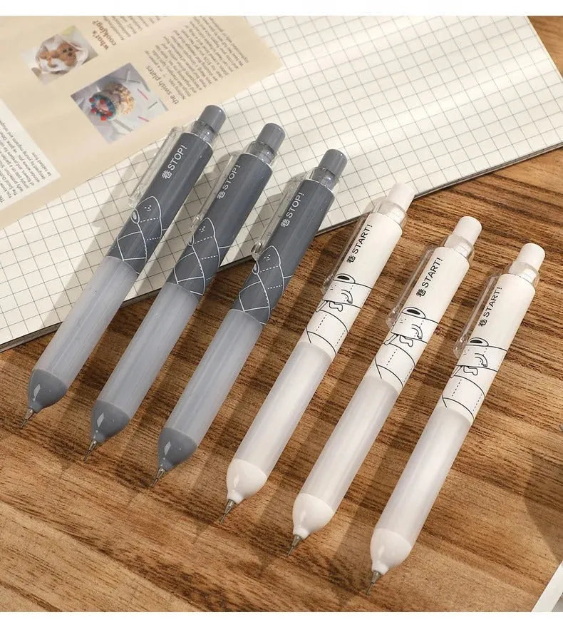Black and white 0.5mm automatic pencils featuring a cloud grip design on the plastic barrel.