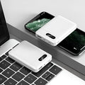 White portable power bank showing multiple USB ports and compact 92x63x23mm dimensions
