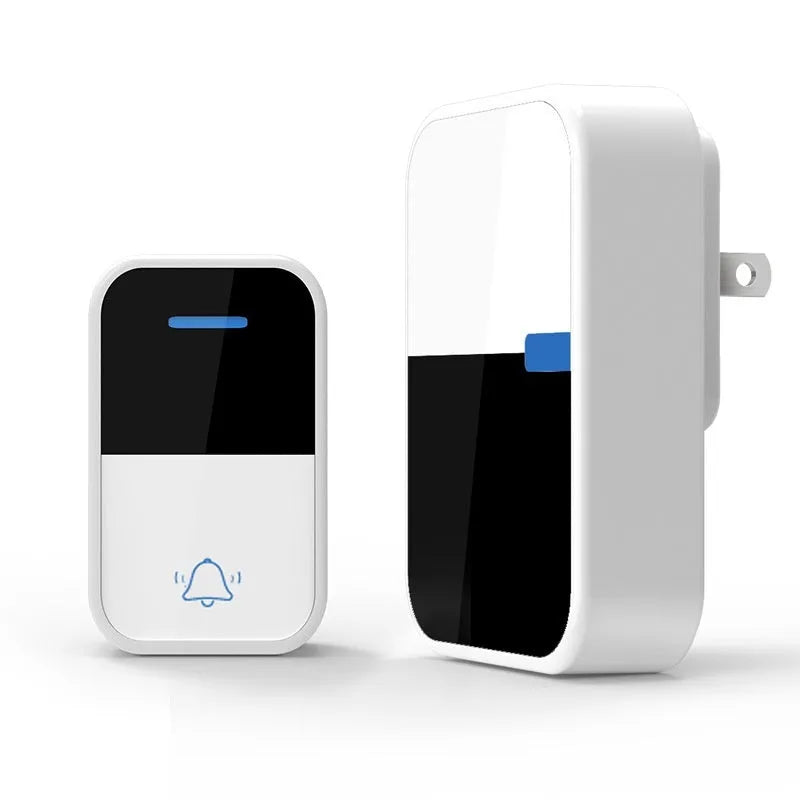 Modern white plastic wireless doorbell receiver and self-generating button unit.