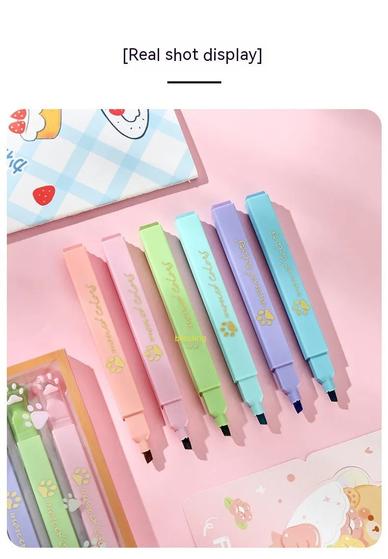 Cat's Paw brand box containing six fluorescent marker pens with oblique heads, in assorted colours.