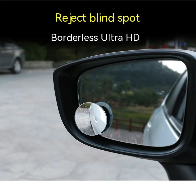 Silver round convex blind spot mirror with adjustable mount for car rearview mirror.