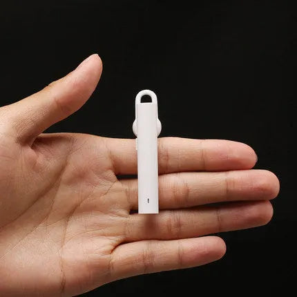 Black and white wireless Bluetooth headset showing compact 5.6cm size with V4.1 Bluetooth technology