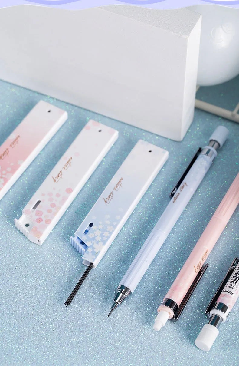 Simplified cartoon automatic pencil set with three 0.5mm HB pencils and refill boxes in mixed colours