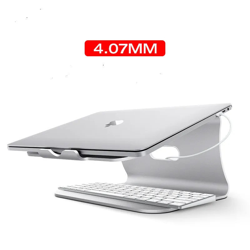 Aluminium alloy rotating laptop cooling bracket in silver or grey colour on a desk.