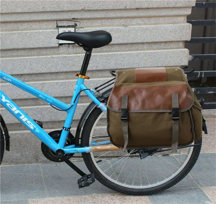 Canvas rear seat storage bag for bicycle or motorcycle in khaki, army green, or black, 27x44x15 cm with zipper pocket