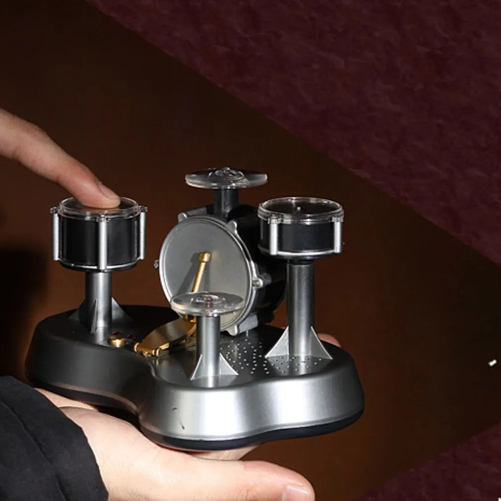 Silver creative finger touch mini drum musical toy with plastic body and finger tapping surface