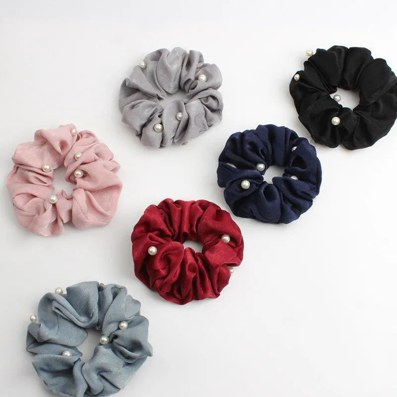 Set of 6 cloth-covered rubber hair rings in black, dark blue, grey, light blue, pink, and red