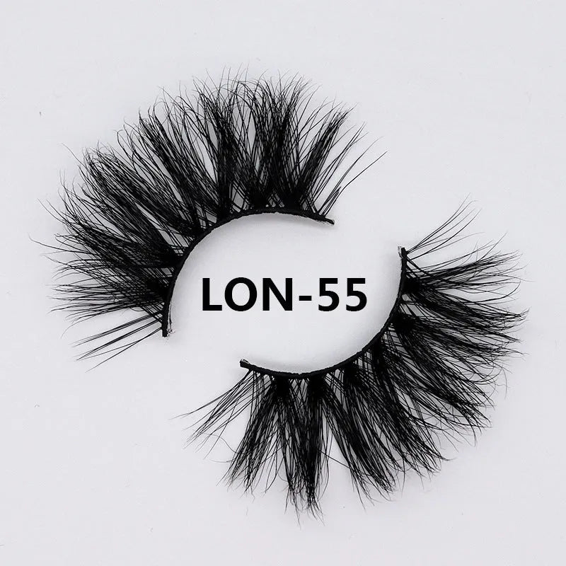 Real mink hair false eyelashes in 25MM3D length with fluffy handmade lash strands on a white background