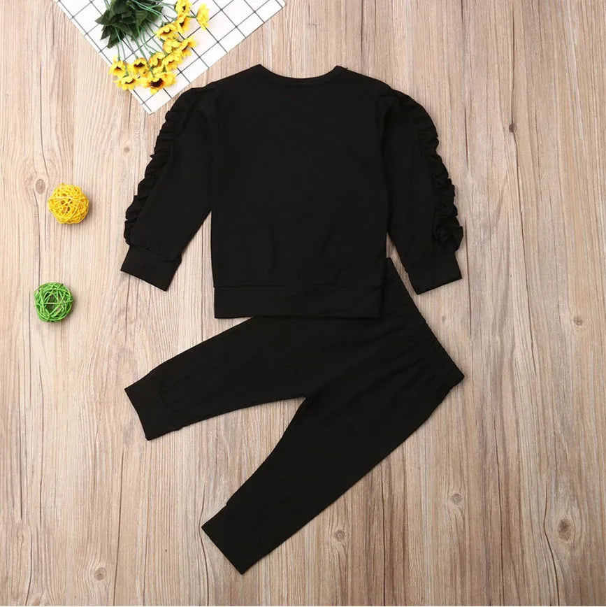 Baby two-piece outfit set with cotton long-sleeve ruffle sweatshirt and pants in solid colour, available in black, brown, wine red