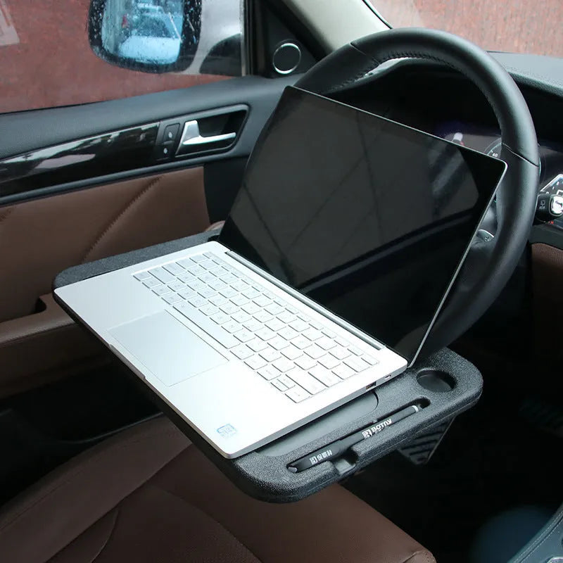 Black ABS steering wheel desk table attached to a car steering wheel with adjustable angle handle