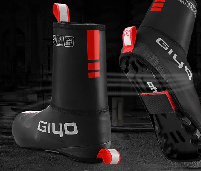 Giyo black cycling waterproof shoe covers with Kevlar and PU construction on a road bike